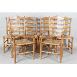 A set of six early 20th century Arts and Crafts ash framed ladder back chairs, in the manner of