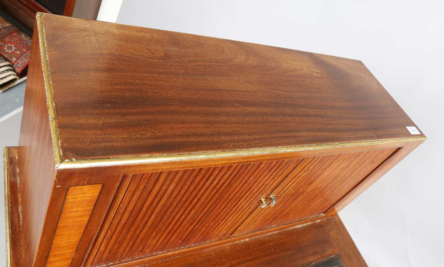 An early 20th century French mahogany and brass mounted bureau plat with raised tambour compartment, - Image 3 of 19