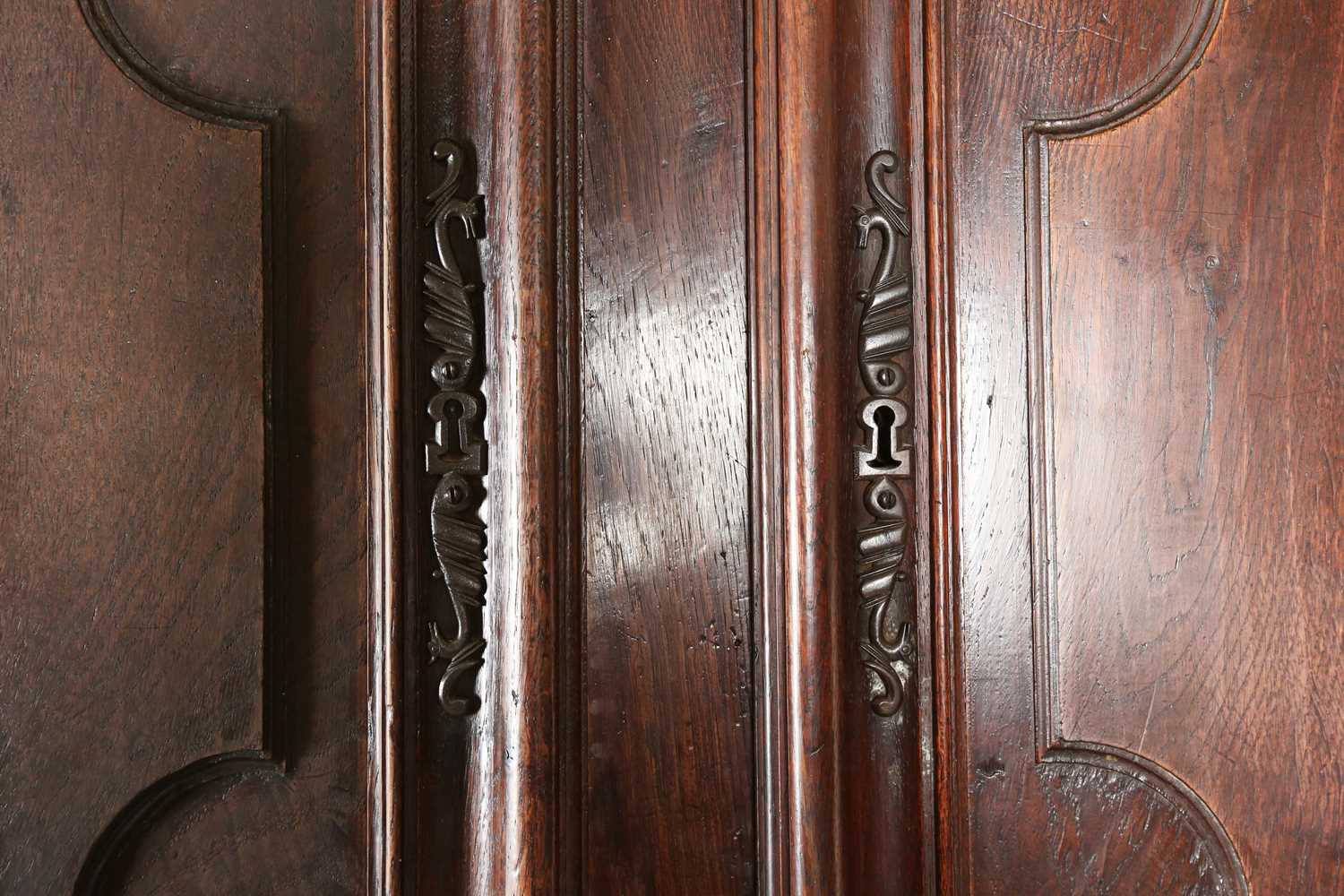 A large 18th century Continental oak cupboard, fitted with four panelled doors and two drawers, - Image 2 of 17