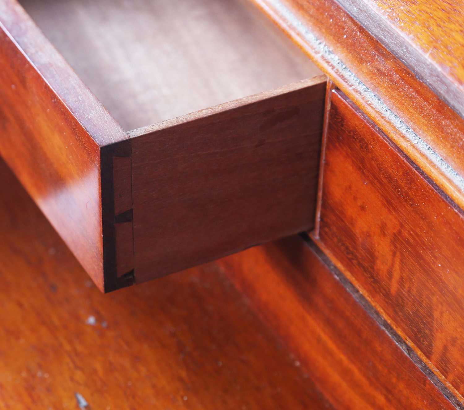 A good early Victorian flame mahogany Davenport, the hinged writing slope inset with tooled - Image 6 of 12