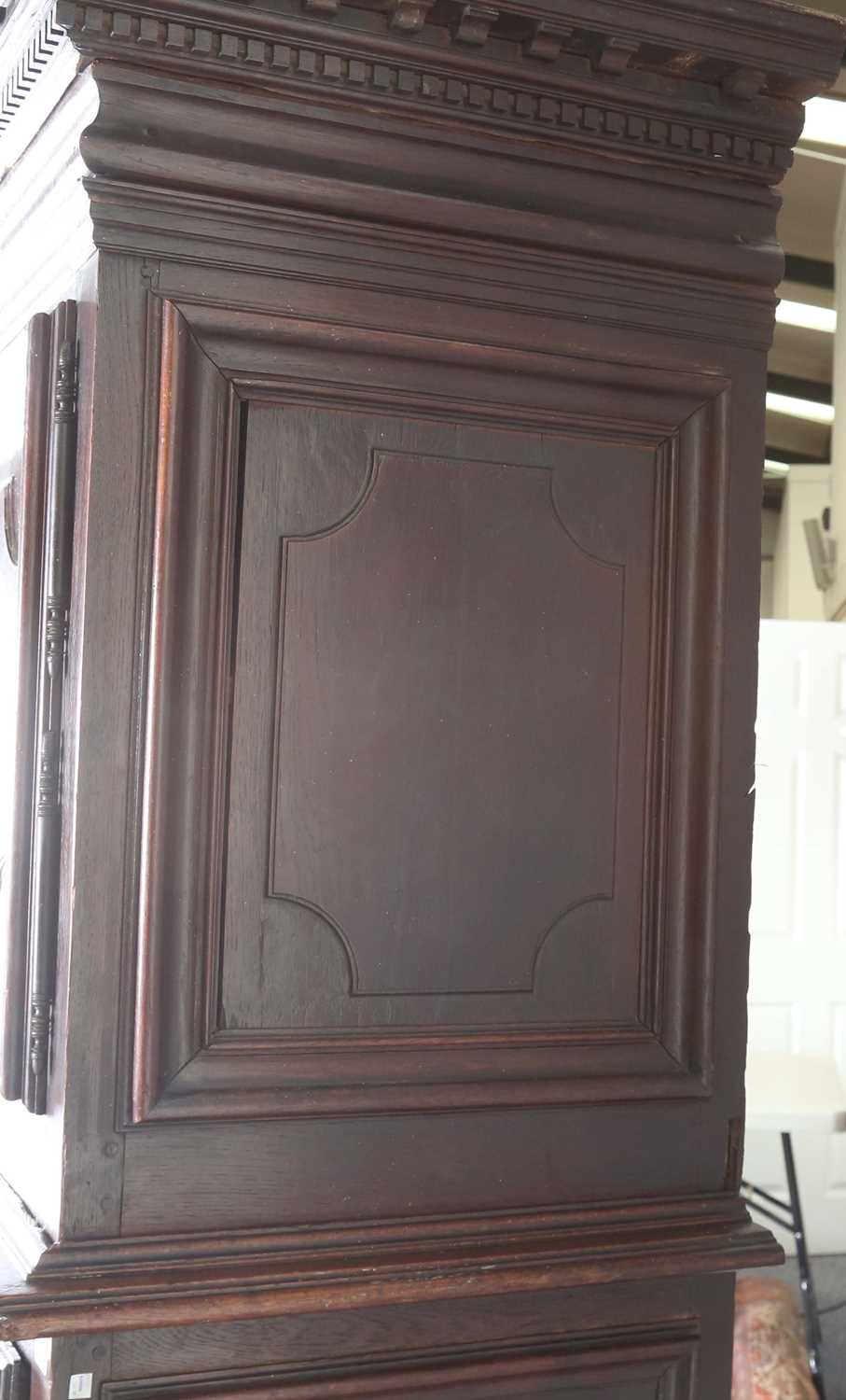 A large 18th century Continental oak cupboard, fitted with four panelled doors and two drawers, - Image 16 of 17