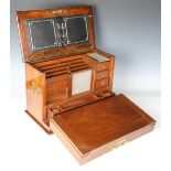 A Victorian burr walnut stationery cabinet writing box by Parkins & Gotto of London, the hinged