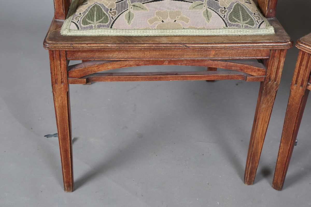 An Art Nouveau stained beech three-piece salon suite with pierced showframe and contemporary fabric, - Image 20 of 27