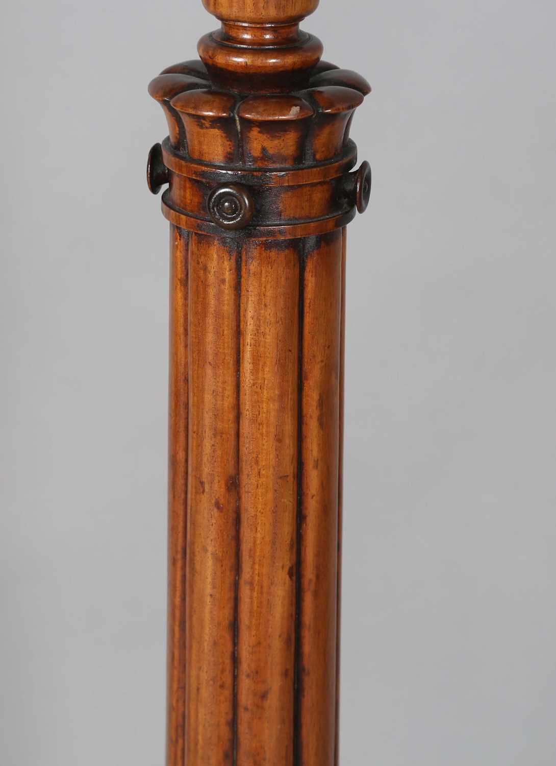 A William IV mahogany torchère, the top fitted with a brass tray above a reeded stem and triform - Image 5 of 9