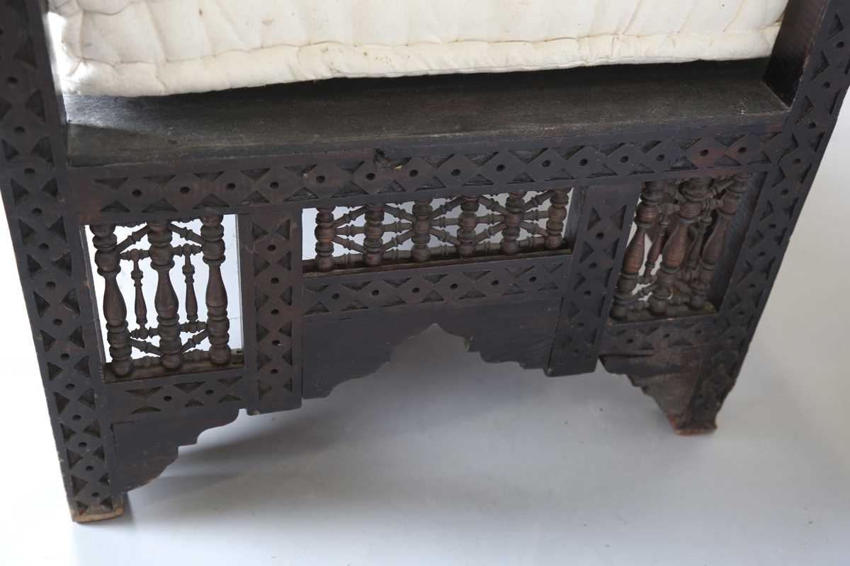 An early 20th century Middle Eastern softwood daybed, similar to those retailed by Liberty & Co, - Image 15 of 15