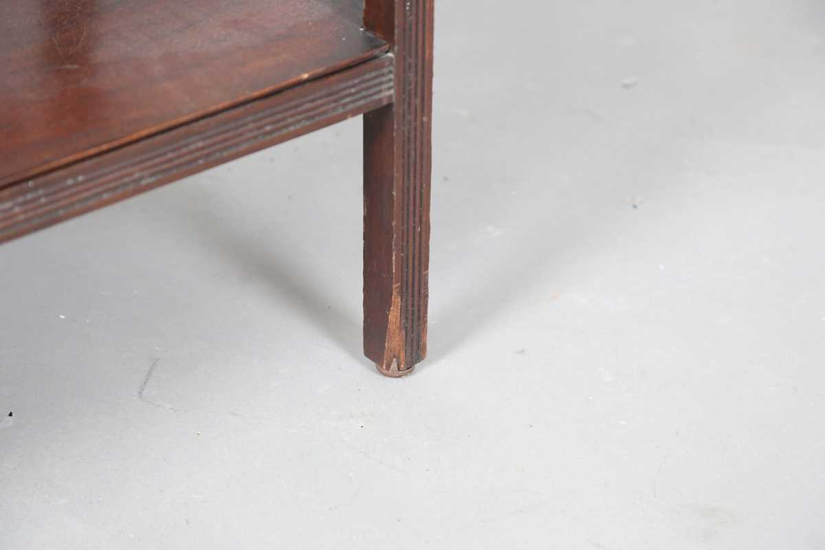A late Victorian Aesthetic Movement mahogany tea table, fitted with a drop-leaf section to each - Image 8 of 9