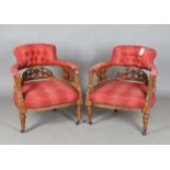 A pair of late Victorian Aesthetic Movement walnut framed tub back salon chairs, height 75cm,