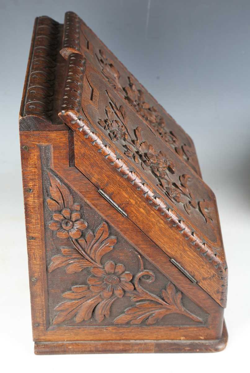 A late Victorian oak slope-front stationery box, carved with leaves and flowers, height 37cm, - Image 8 of 16