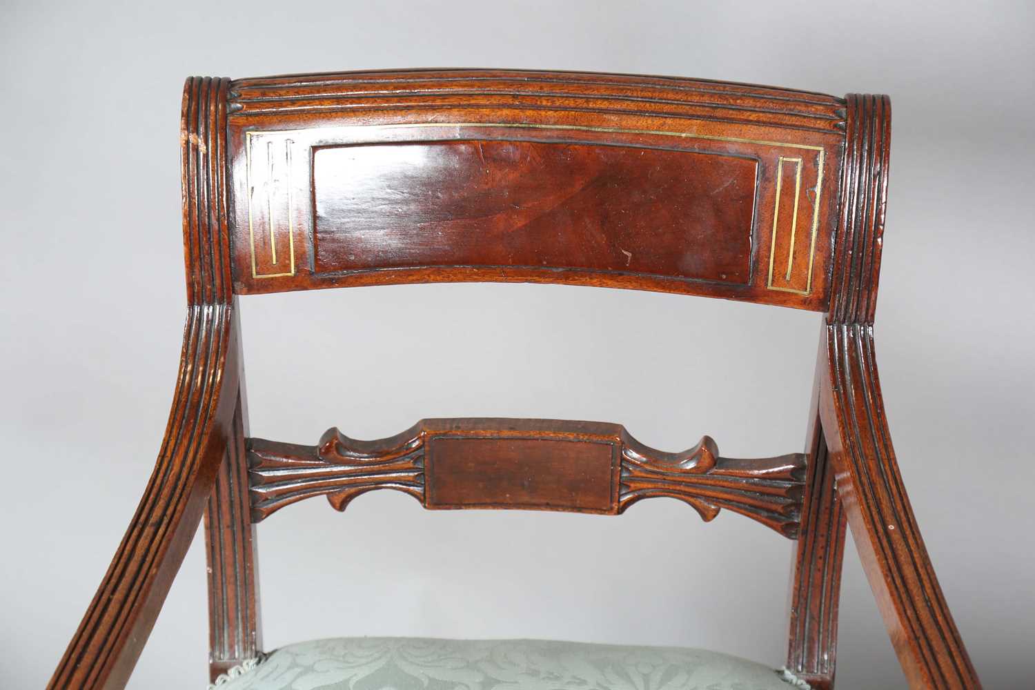 A set of eight Regency mahogany and brass inlaid bar back dining chairs, comprising two carvers, - Image 2 of 17