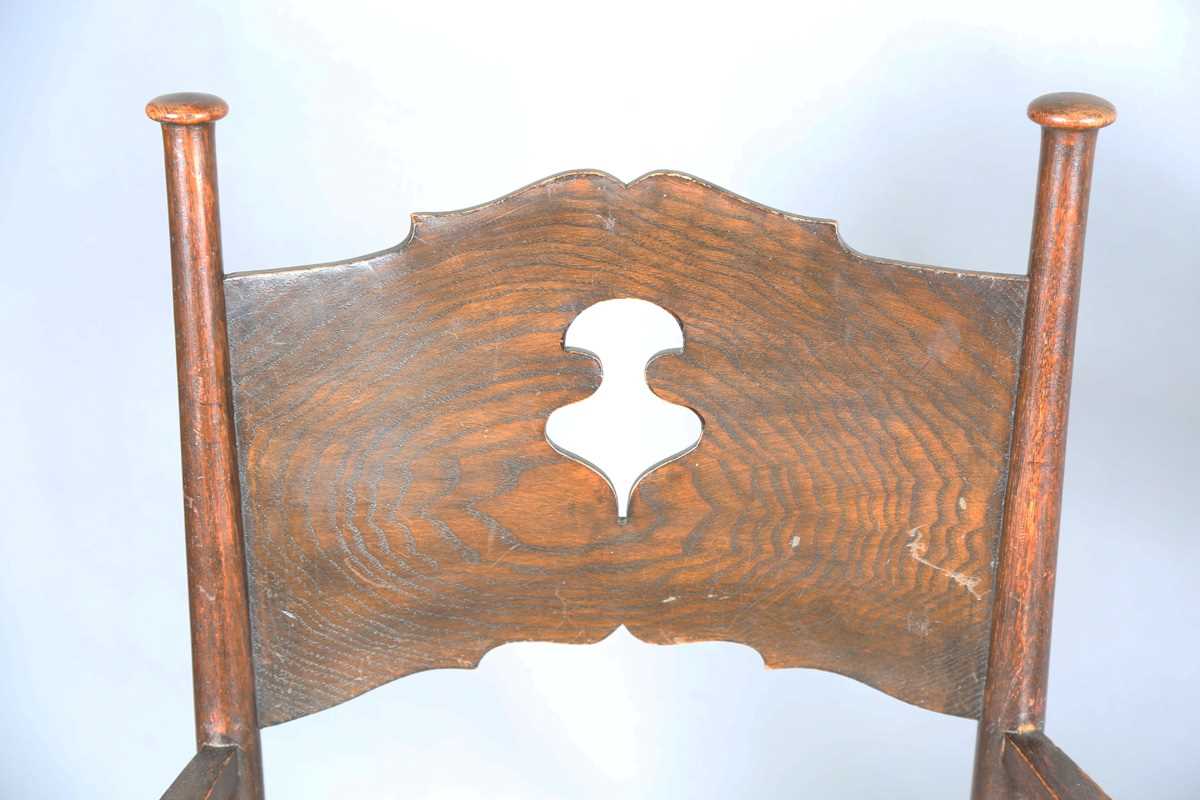 A pair of early 20th century Arts and Crafts oak and ash framed elbow chairs, in the manner of - Image 2 of 12