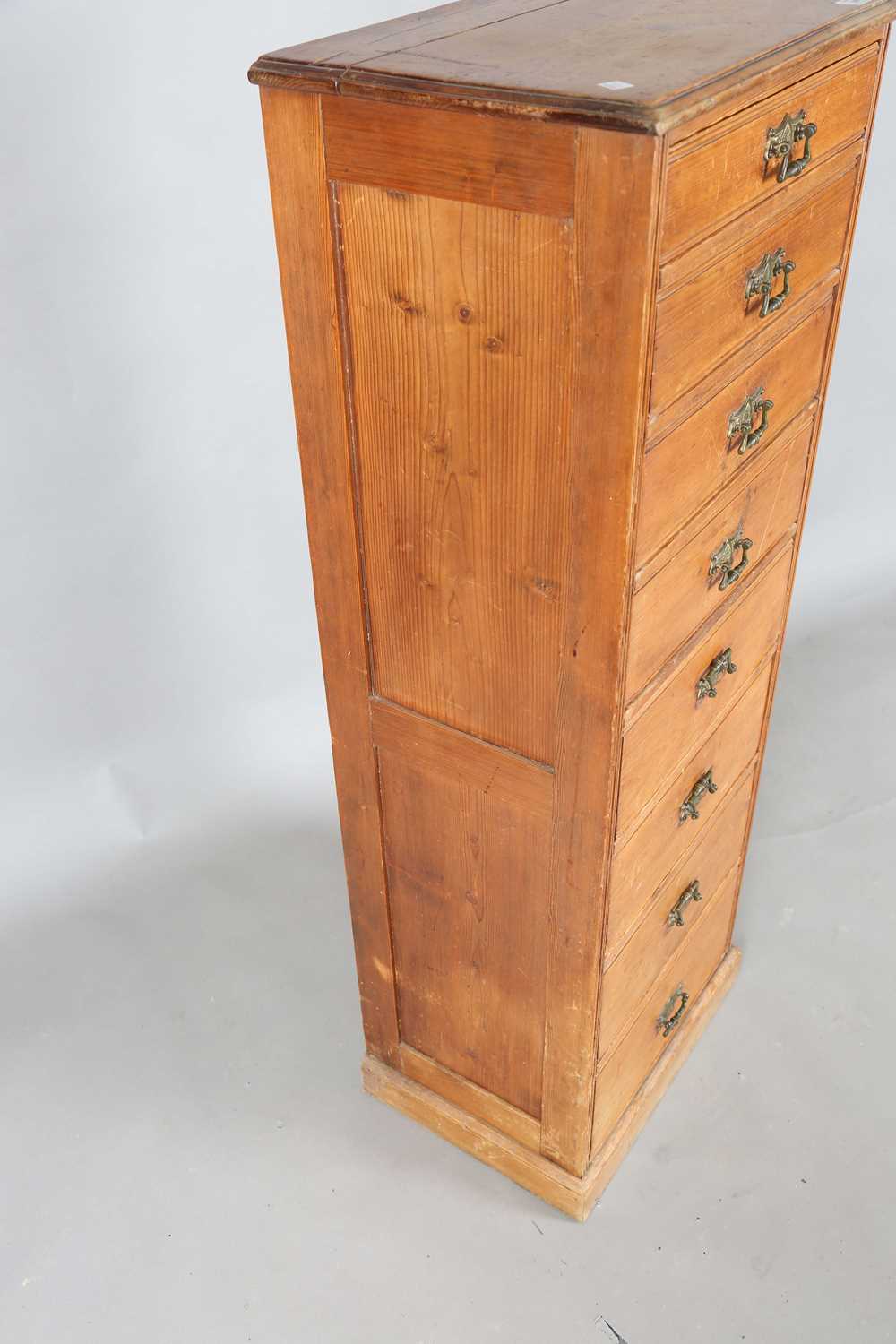 A late Victorian pine narrow chest of eight drawers, height 125cm, width 44cm, depth 33cm, - Image 6 of 12