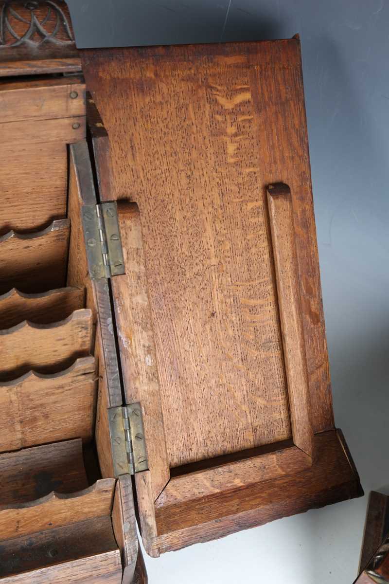 A late Victorian oak slope-front stationery box, carved with leaves and flowers, height 37cm, - Image 7 of 16