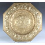 An early 20th century Arts and Crafts Glasgow School brass octagonal charger, in the manner of