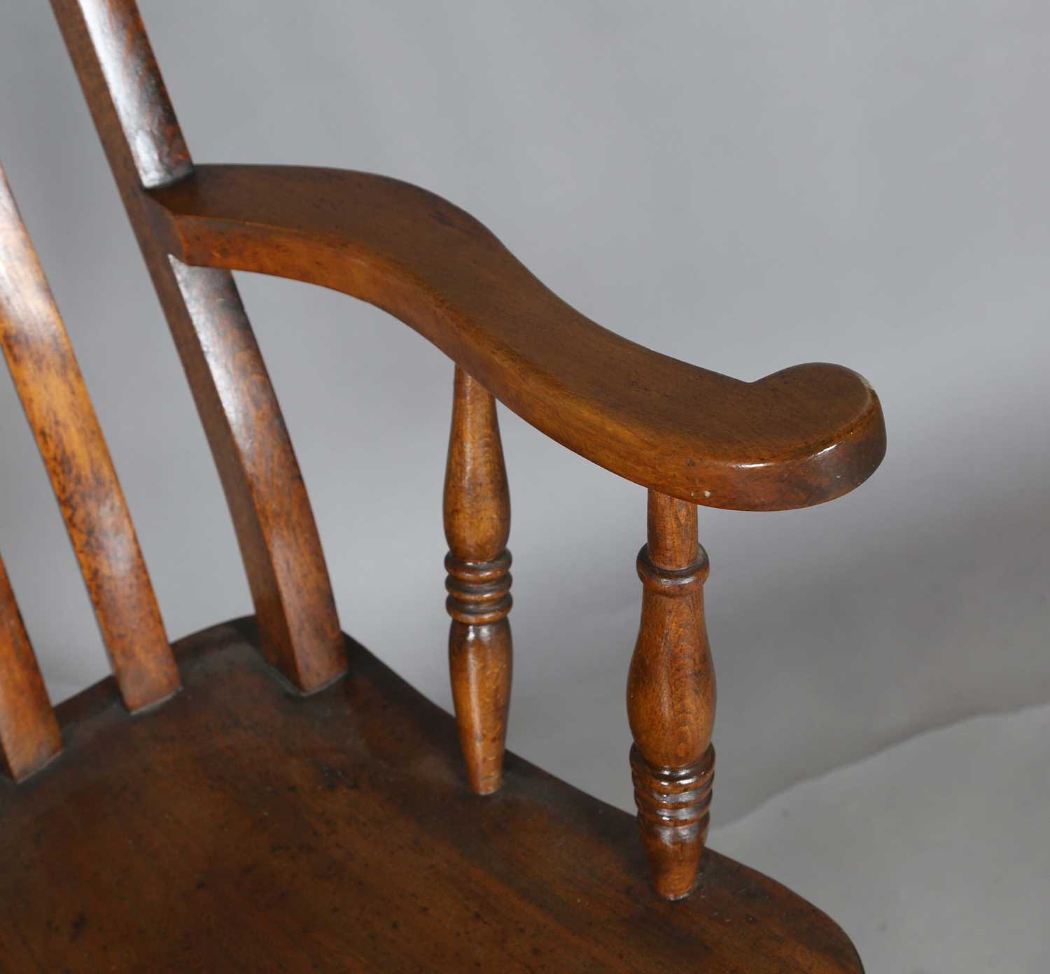 A late Victorian ash and elm comb back Windsor armchair, height 111cm, width 57cm, depth 69cm. - Image 5 of 9