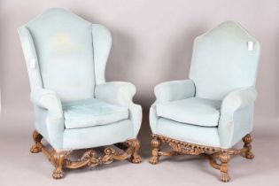 A pair of early 20th century Baroque Revival lady's and gentleman's armchairs, both raised on carved