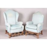 A pair of early 20th century Baroque Revival lady's and gentleman's armchairs, both raised on carved