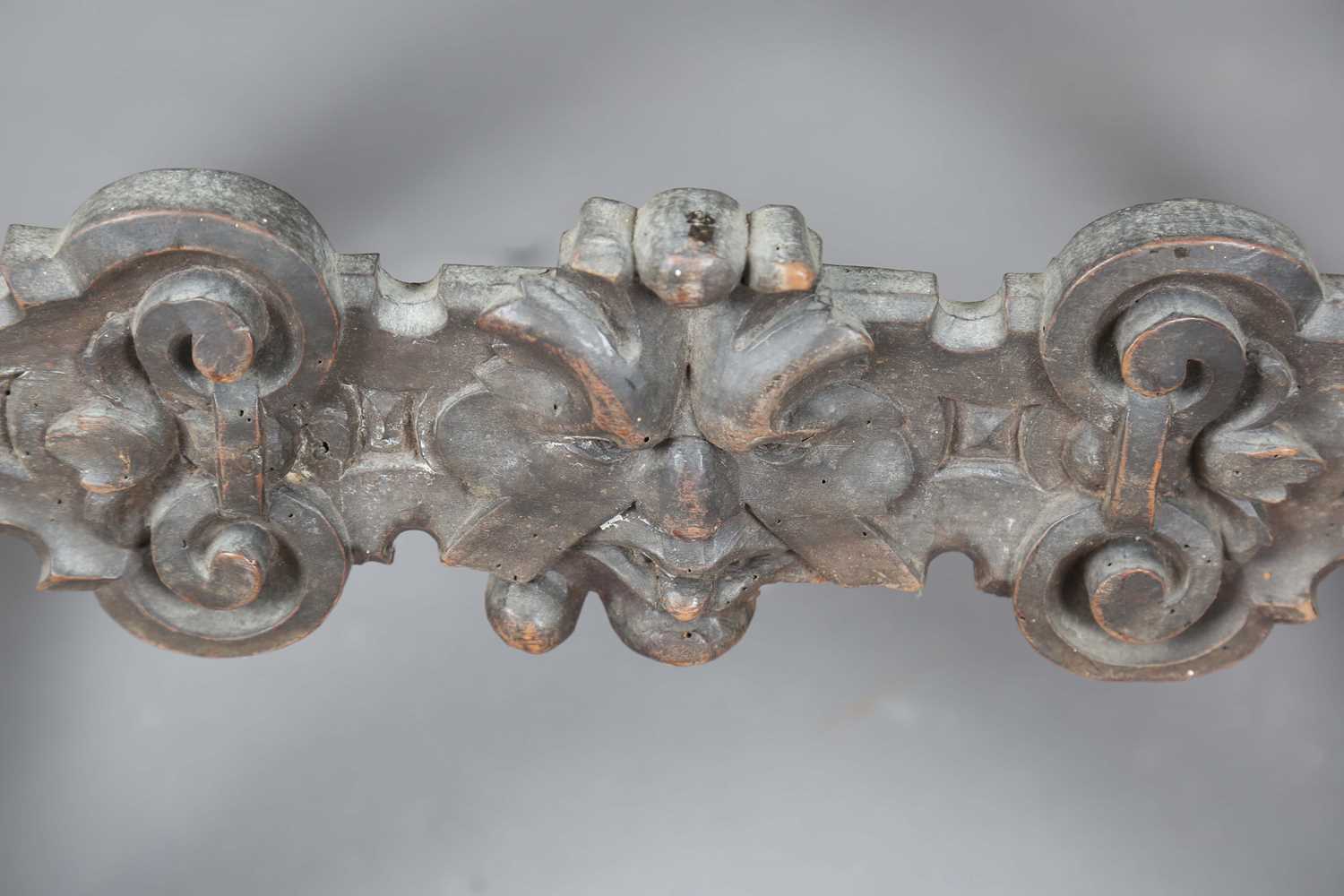 A late 17th century Continental walnut armchair, the finials carved with masks, the two front legs - Image 8 of 15