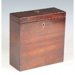 A George III mahogany apothecary's box, the hinged lid with applied paper manufacturer's label