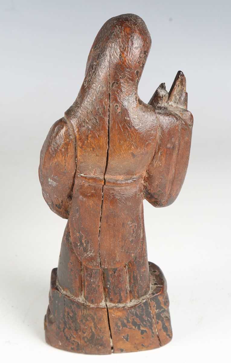 A Continental carved wooden figure of a saint, 16th/17th century, modelled holding a staff, length - Bild 10 aus 15