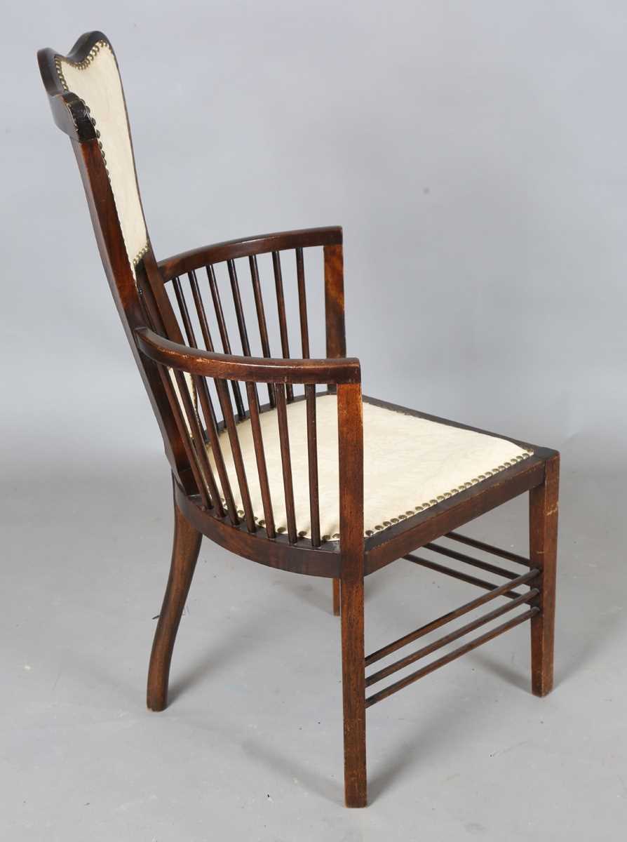 An Edwardian Arts and Crafts style stained walnut showframe armchair, upholstered in cream fabric, - Image 11 of 17