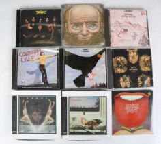 A collection of seventy-six mainly rock compact discs, including CDs by The Who, Genesis, David