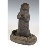 Richard Fisher - a limited edition bronzed resin model of an otter, bearing cast signature and