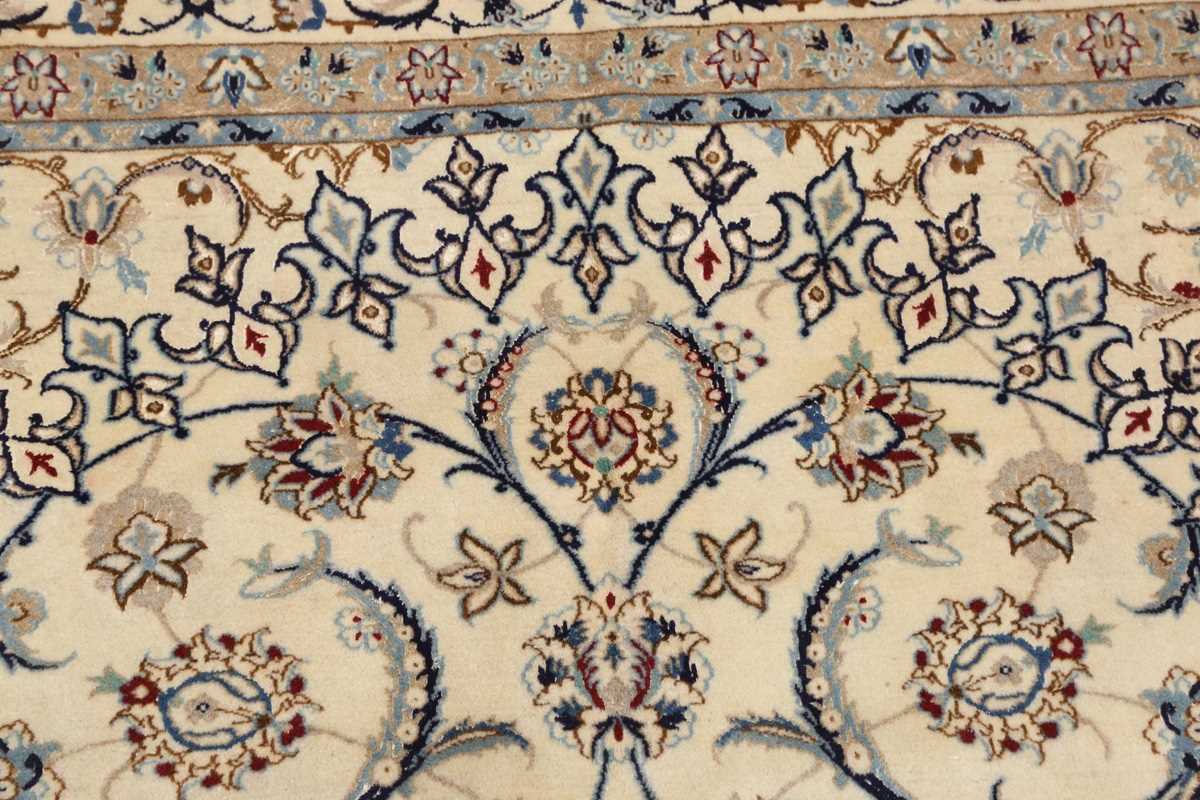 A Nain carpet, Central Persia, late 20th century, the cream field with a flowerhead medallion and - Image 3 of 8