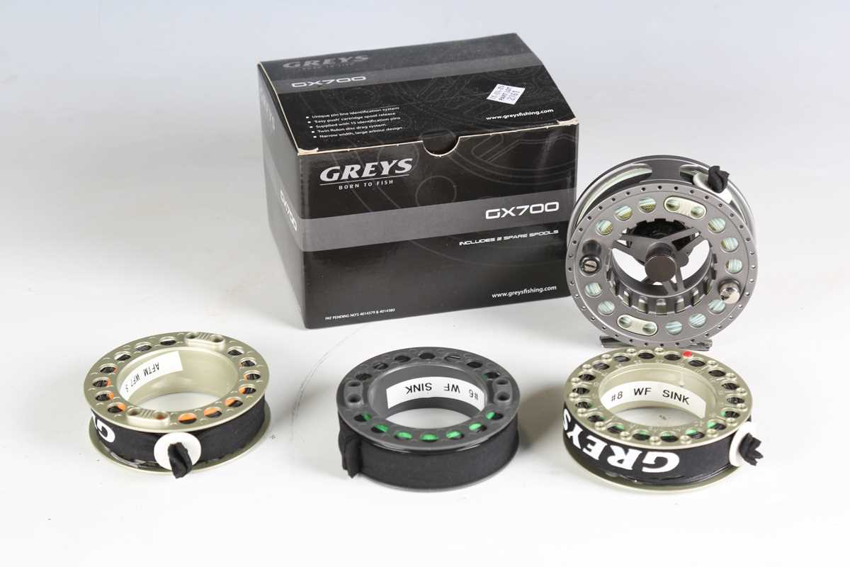 A group of five modern fly fishing reels, including a Hardy 'Uniqua' 5/6, diameter 9cm, boxed, an - Image 10 of 10