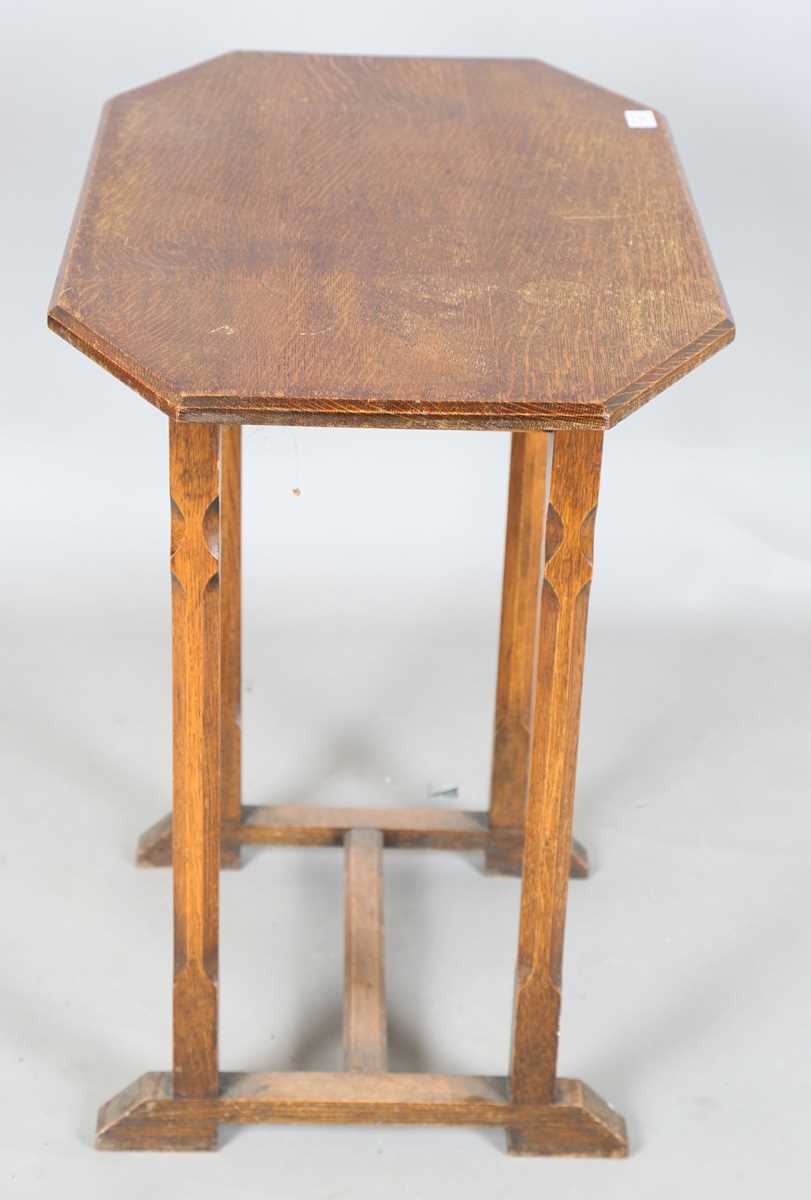 An early 20th century Arts and Crafts style oak canted rectangular occasional table, raised on - Image 6 of 6