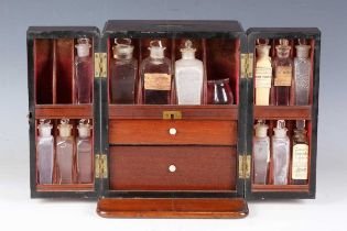 A late George III mahogany apothecary's travelling case, the top with recessed brass handle above