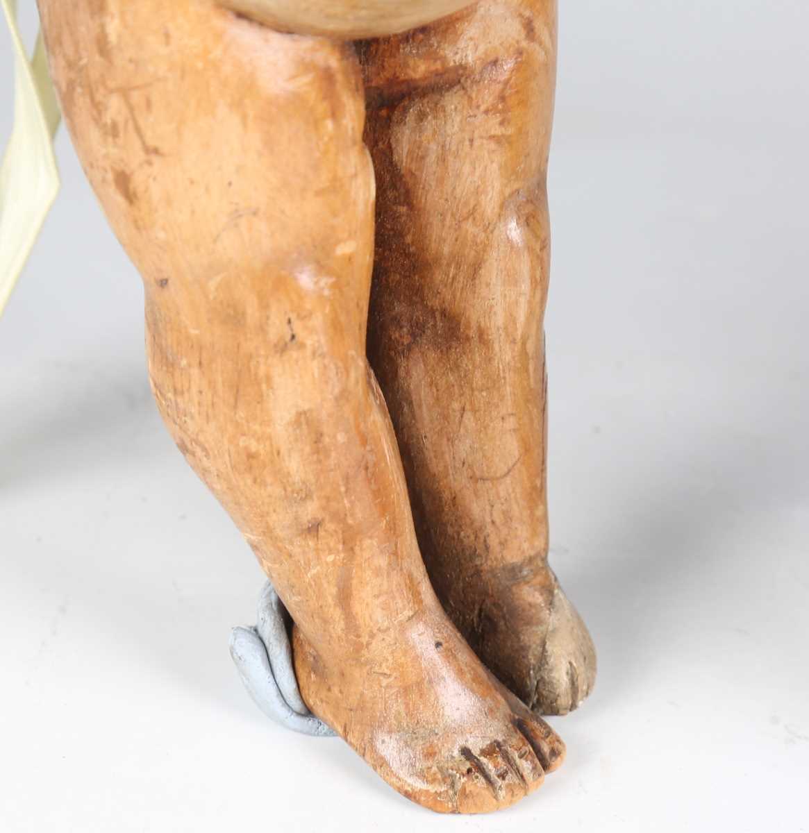 A Continental carved wooden figure of a saint, 16th/17th century, modelled holding a staff, length - Bild 4 aus 15