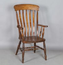 A late Victorian ash and elm comb back Windsor armchair, height 111cm, width 57cm, depth 69cm.