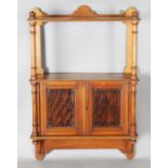 An Edwardian walnut and parcel gilt decorated two-tier wall cabinet, height 75cm, width 51cm,