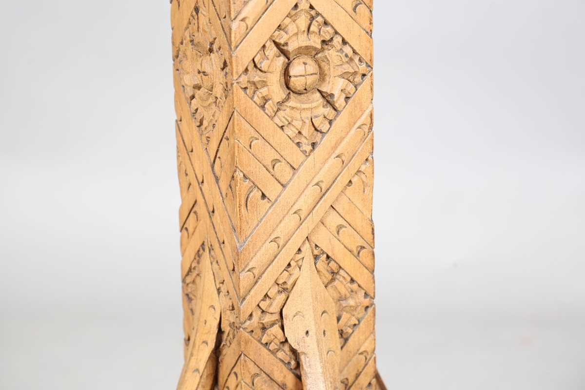 A 20th century Arts and Crafts style carved softwood centre table, the top decorated with wheat - Image 6 of 10