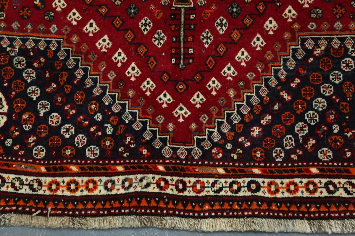 A Ghashghai rug, South-west Persia, late 20th century, the red field with three linked medallions, - Image 6 of 7