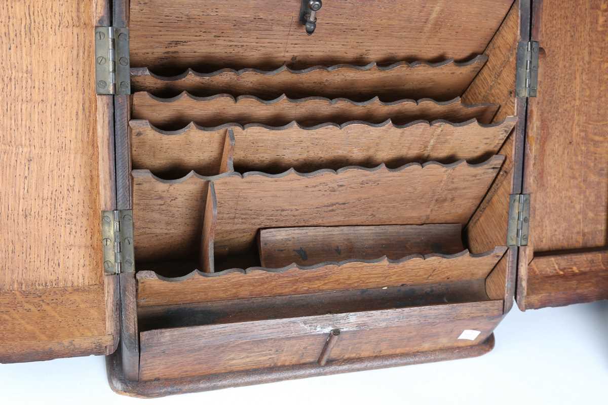 A late Victorian oak slope-front stationery box, carved with leaves and flowers, height 37cm, - Image 4 of 16