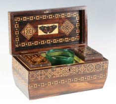 A Victorian Tunbridge ware rosewood tea caddy of sarcophagus form, the lid with a geometric cuboid