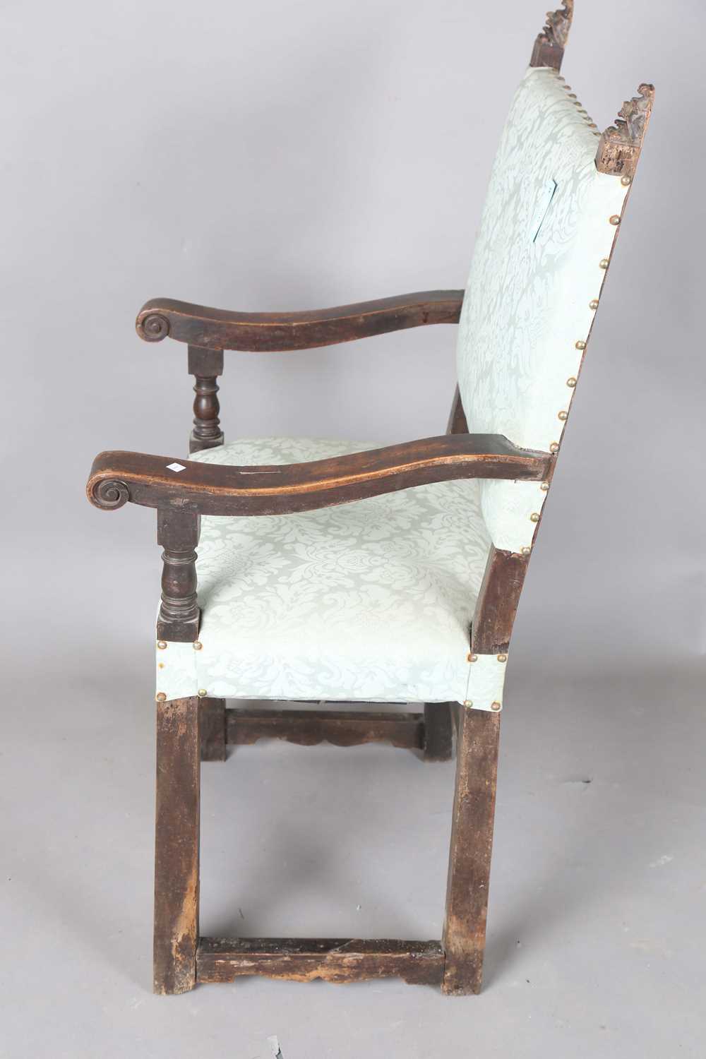 A late 17th century Continental walnut armchair, the finials carved with masks, the two front legs - Image 14 of 15