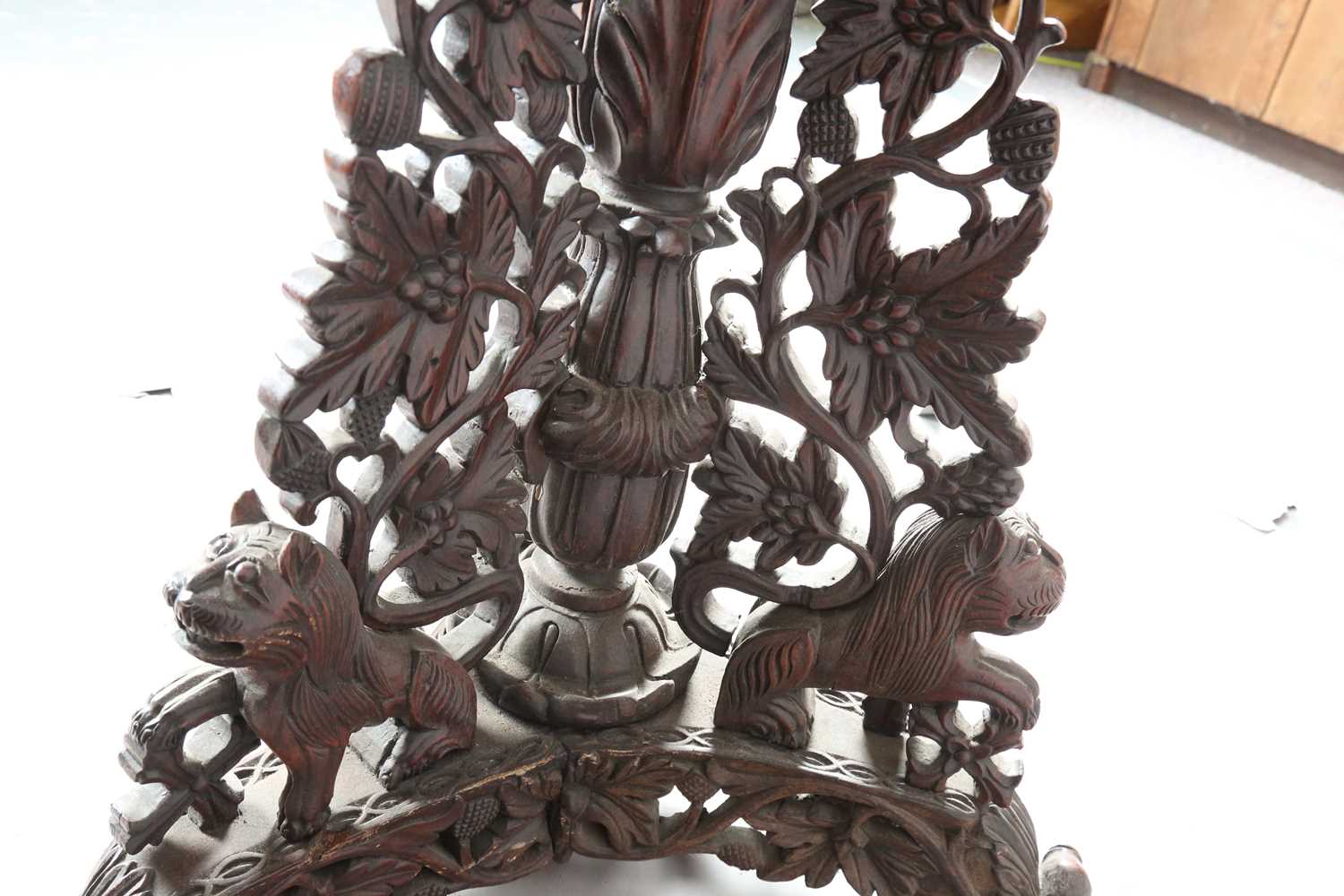 A 19th century Burmese hardwood centre table, the shaped circular top above a tripod support of - Image 12 of 13