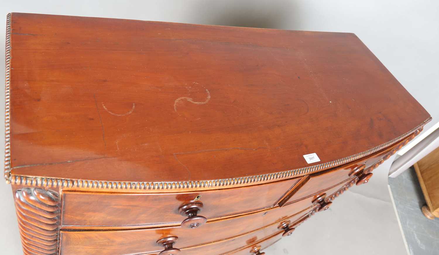 A Victorian mahogany bowfront chest of drawers with reeded pilasters and squat bun feet, height - Image 2 of 11
