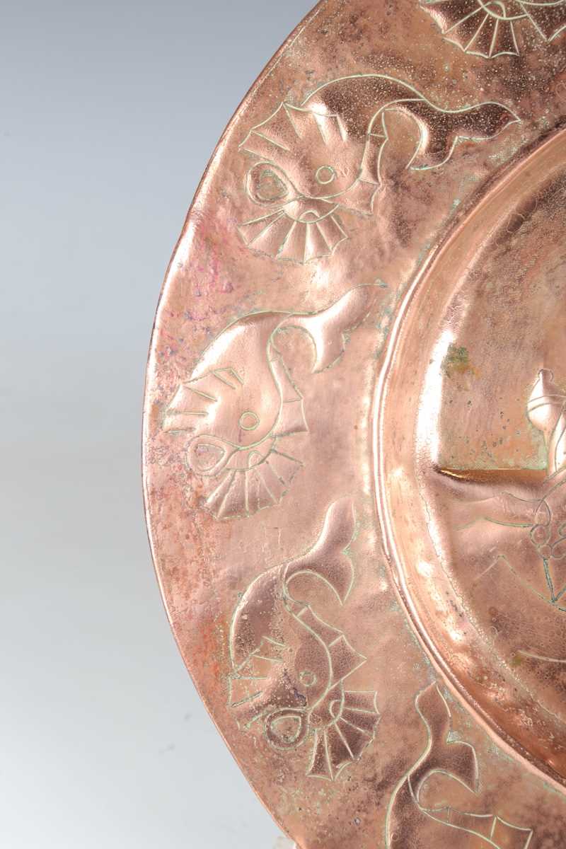 A Newlyn style copper circular charger, worked with a central galleon within a border of fish, - Image 6 of 7