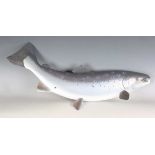 A late 20th century carved and painted wooden model of a leaping 8½lb salmon by Peter Lyne, circa