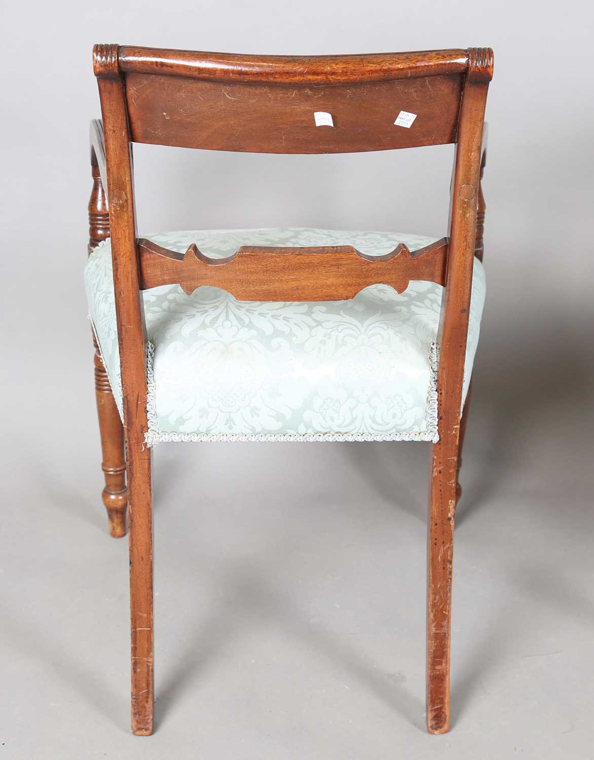 A set of eight Regency mahogany and brass inlaid bar back dining chairs, comprising two carvers, - Image 10 of 17