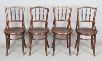 A set of four late 19th/early 20th century Thonet style bentwood bistro chairs with foliate