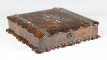 A mid-19th century French papier-mâché simulated walnut and brass bound card game box, the hinged