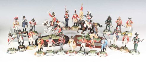 Twenty-three Stadden cold painted metal military figures, including two equestrian figure groups,