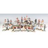 Twenty-three Stadden cold painted metal military figures, including two equestrian figure groups,