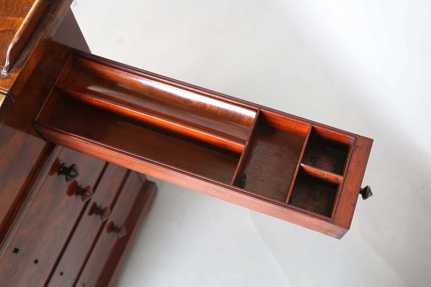 A good early Victorian flame mahogany Davenport, the hinged writing slope inset with tooled - Image 10 of 12