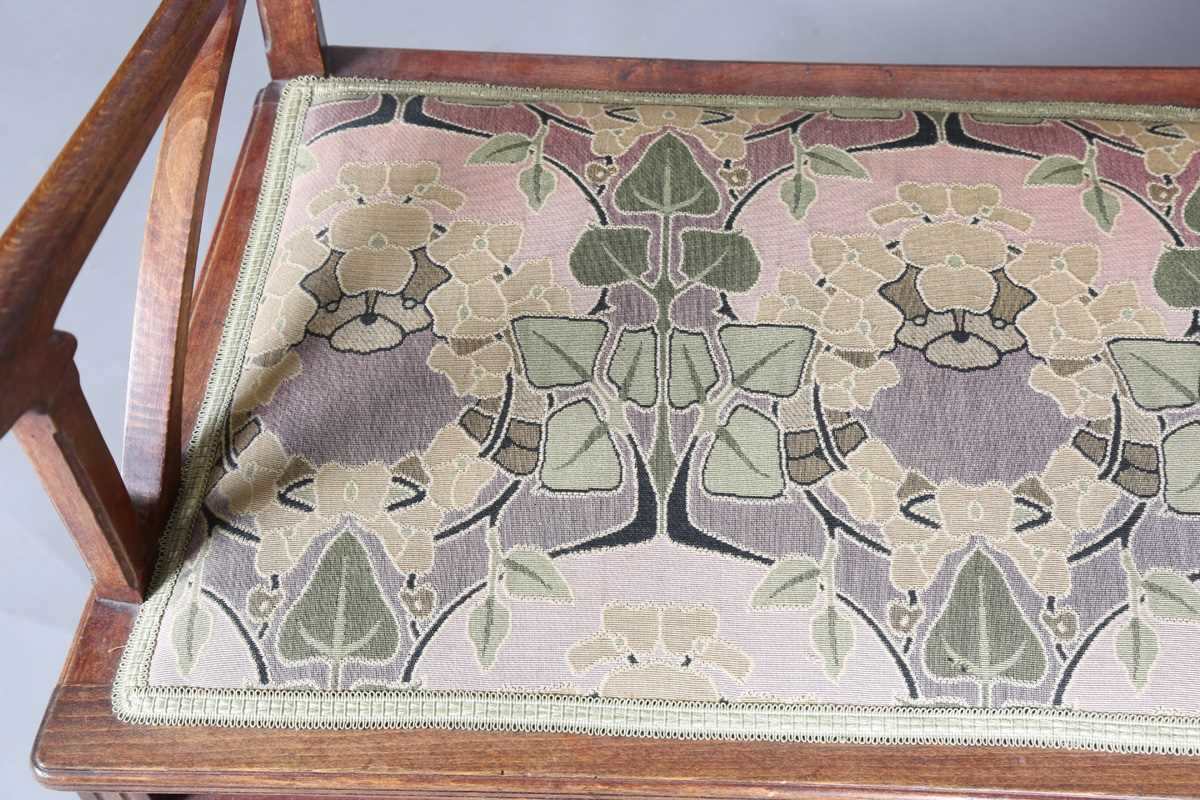 An Art Nouveau stained beech three-piece salon suite with pierced showframe and contemporary fabric, - Image 5 of 27