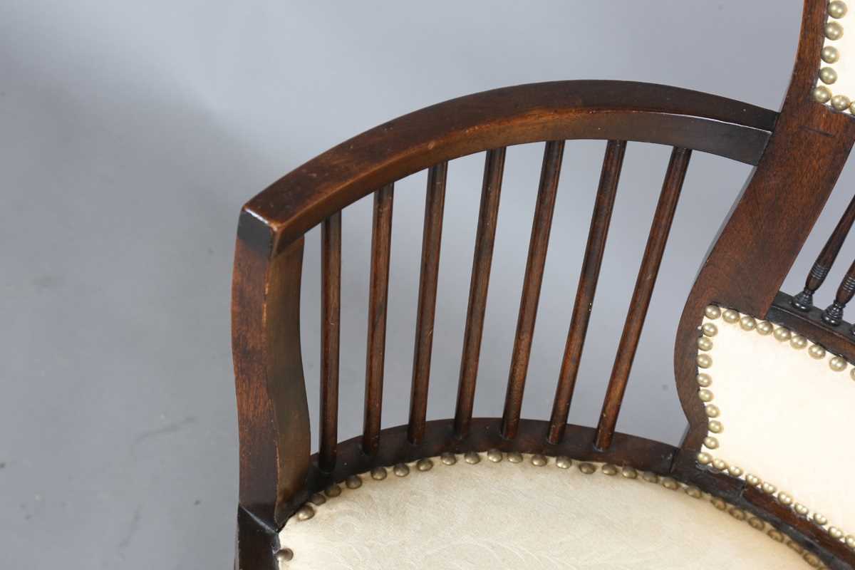 An Edwardian Arts and Crafts style stained walnut showframe armchair, upholstered in cream fabric, - Image 7 of 17